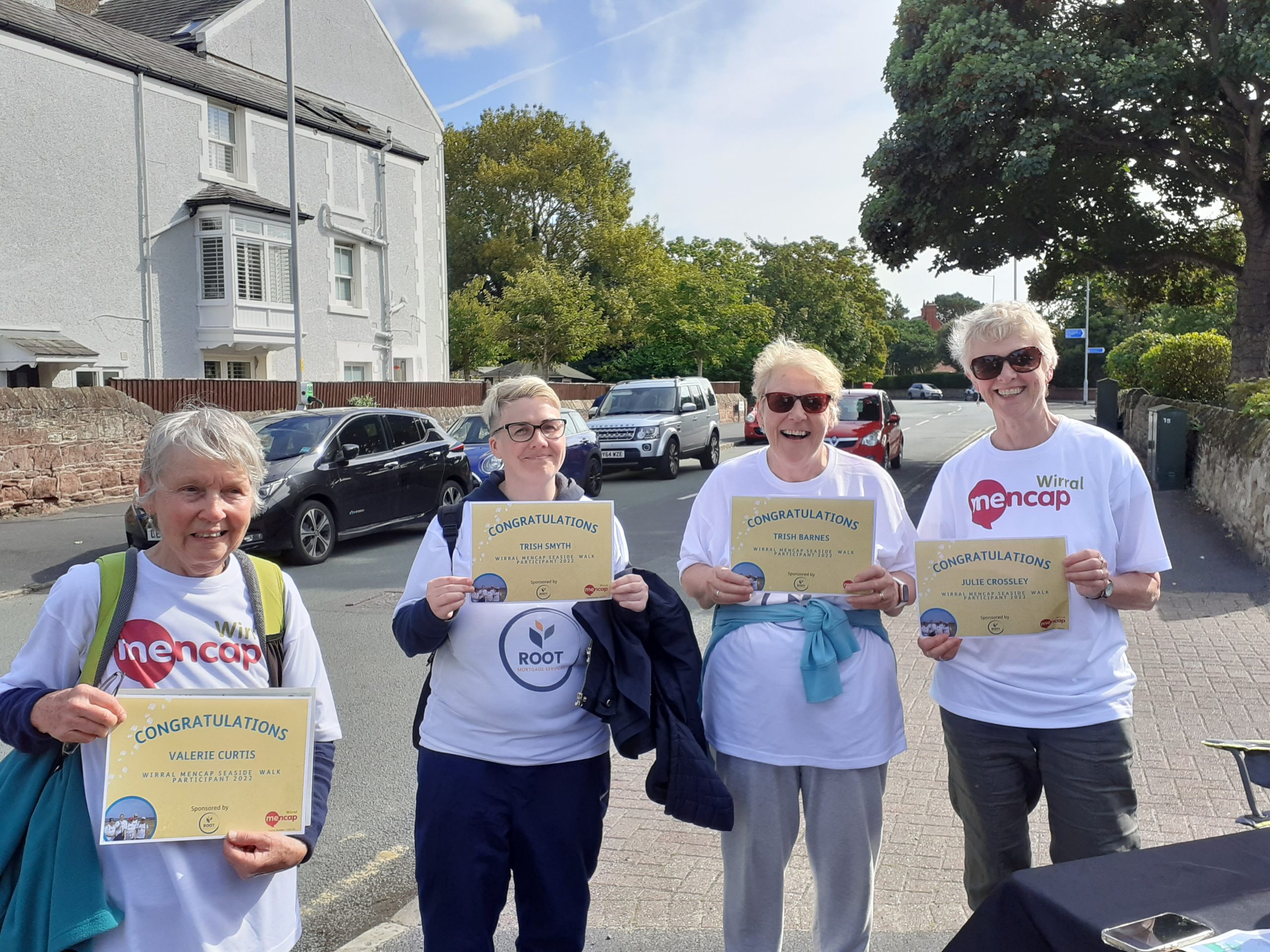 Previous walkers with their certificates